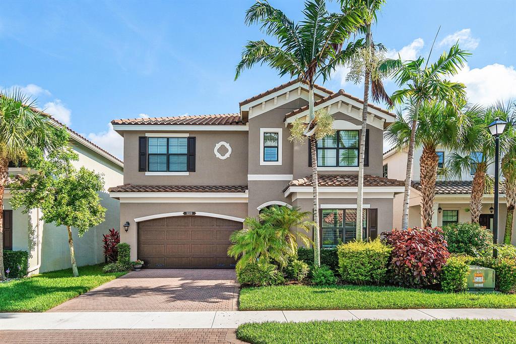 Tuscany by GL Homes 4-bedroom Mediterranean home with palm trees